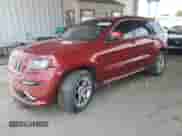 2012 Jeep Grand Cherokee SRT-8 z VIN 1C4RJFDJ9CC297461, wystawiony jako Copart lot #69259795 z przebiegiem Nie podano mil oraz Czysty tytuł • Clean title. Historia ofert i sprzedaży dostępna na DreamBid. Obrazek 1.