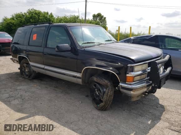 1997 Chevrolet Tahoe with VIN 1GNEK13R8VJ302550, listed as a Copart auction lot 60456735 with 253,393 mi miles and Clean title. Bid and sale history available at DreamBid. Image 4.