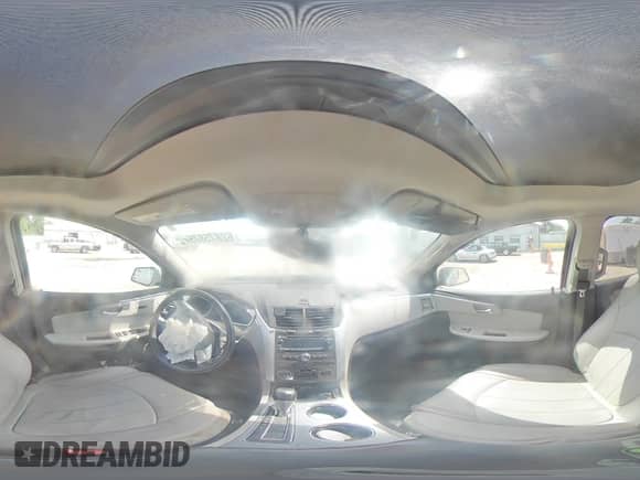 2012 Chevrolet Traverse LTZ с VIN 1GNKRLED7CJ337539, выставлен на аукционе Copart как лот 62875875 с пробегом Не указан миль и Списание • Salvage title. История ставок и продаж доступна на DreamBid. Изображение 14.