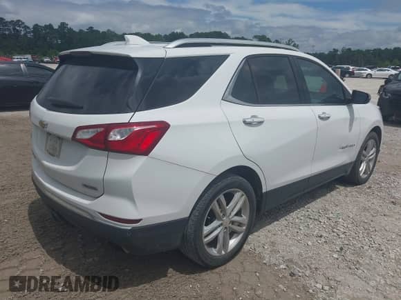 2018 Chevrolet Equinox Premier with VIN 2GNAXNEXXJ6338654, listed as a IAAI auction lot 43047391 with 97,169 mi miles and . Bid and sale history available at DreamBid. Image 4.