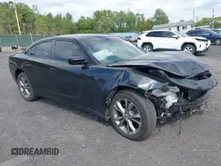 2020 Dodge Charger SXT with VIN 2C3CDXJG0LH238974, listed as a IAAI auction lot 43031332 with 71,217 mi miles and . Bid and sale history available at DreamBid. Image 1.