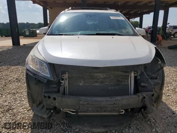 2017 Chevrolet Traverse Premier с VIN 1GNKRJKD8HJ103393, выставлен на аукционе Copart как лот 69309435 с пробегом 178 668 миль миль и Списание • Salvage title. История ставок и продаж доступна на DreamBid. Изображение 5.