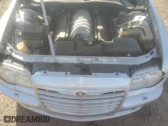 2006 Chrysler 300 C SRT-8 z VIN 2C3LA73W76H536066, wystawiony jako Copart lot #64013005 z przebiegiem 137 115 mil mil oraz Szkoda całkowita • Salvage title. Historia ofert i sprzedaży dostępna na DreamBid. Obrazek 11.