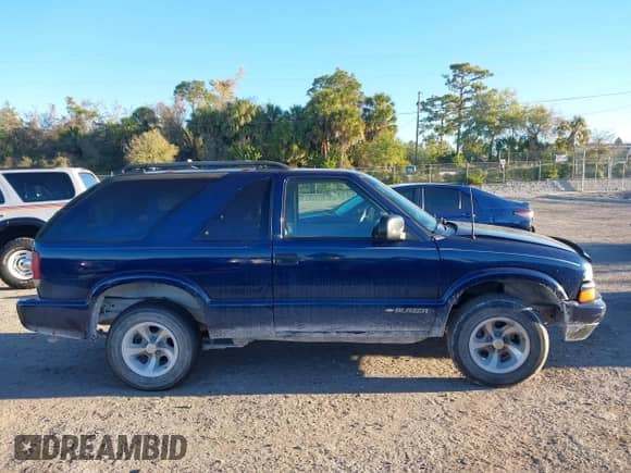 2002 Chevrolet Blazer LS с VIN 1GNCS18W12K127425, выставлен на аукционе IAAI как лот 41823290 с пробегом 182 949 миль миль и . История ставок и продаж доступна на DreamBid. Изображение 14.