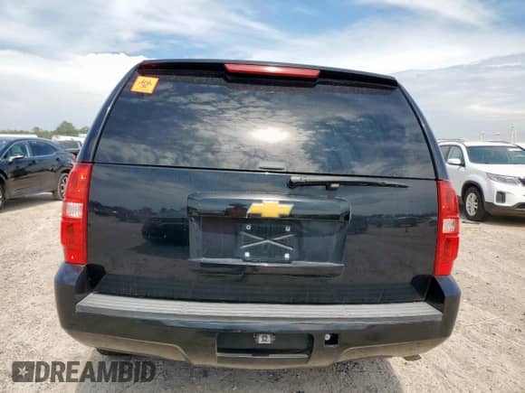 2014 Chevrolet Tahoe Commercial с VIN 1GNLC2E07ER228869, выставлен на аукционе Copart как лот 67551605 с пробегом 140 384 миль миль и Списание • Salvage title. История ставок и продаж доступна на DreamBid. Изображение 6.