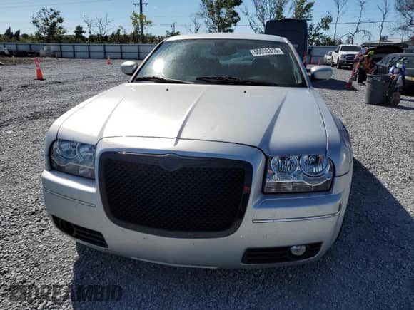 2007 Chrysler 300 Limited с VIN 2C3KA53G97H658292, выставлен на аукционе Copart как лот 50033315 с пробегом 176 230 миль миль и Списание • Salvage title. История ставок и продаж доступна на DreamBid. Изображение 5.