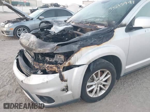 2014 Dodge Journey SXT with VIN 3C4PDCBGXET187188, listed as a IAAI auction lot 43275941 with Not provided miles and . Bid and sale history available at DreamBid. Image 15.
