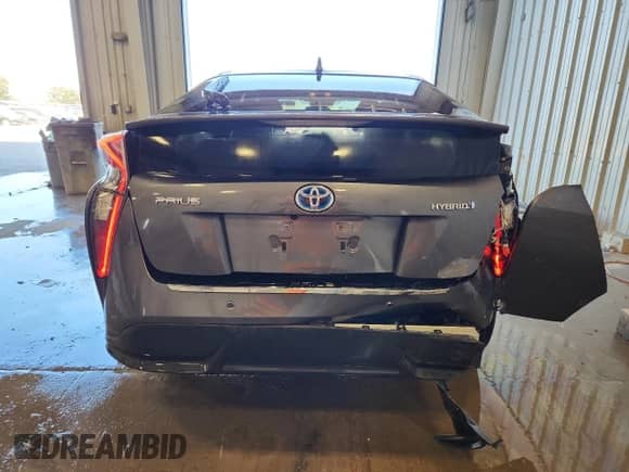 2018 Toyota Prius Two Eco z VIN JTDKARFU8J3065635, wystawiony jako Copart lot #84043455 z przebiegiem 113 173 mil mil oraz Czysty tytuł • Clean title. Historia ofert i sprzedaży dostępna na DreamBid. Obrazek 6.