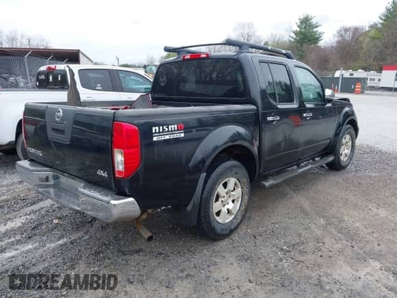 2005 Nissan Frontier SE z VIN 1N6AD07W05C445098, wystawiony jako IAAI lot #41941048 z przebiegiem 276 234 mil mil oraz . Historia ofert i sprzedaży dostępna na DreamBid. Obrazek 4.
