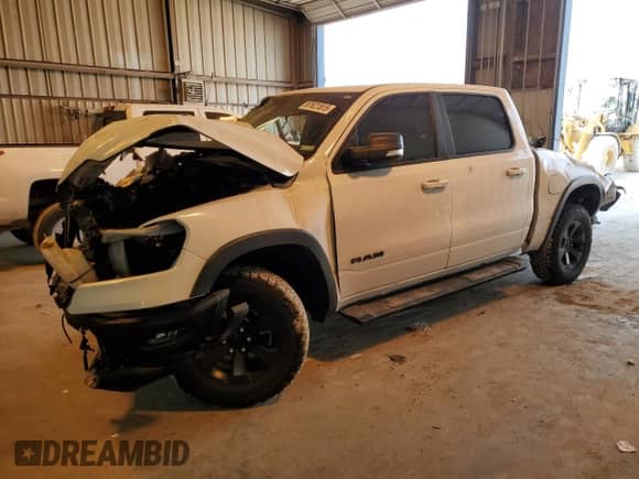 2022 Ram 1500 Rebel z VIN 1C6SRFLM1NN136249, wystawiony jako Copart lot #87621815 z przebiegiem 76 312 mil mil oraz Szkoda całkowita • Salvage title. Historia ofert i sprzedaży dostępna na DreamBid. Obrazek 1.