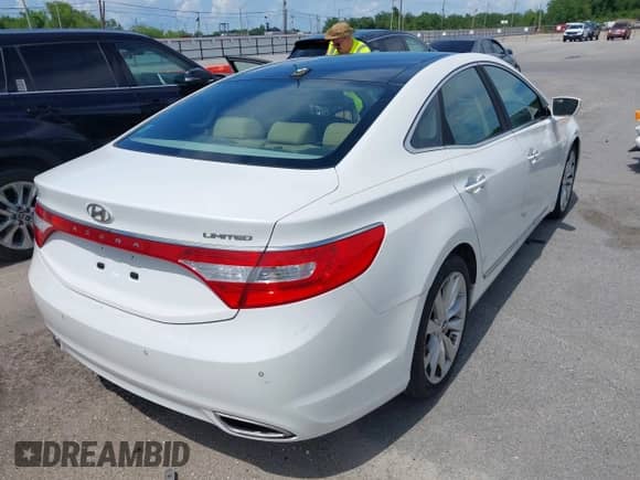 2014 Hyundai Azera Limited z VIN KMHFH4JG9EA353114, wystawiony jako IAAI lot #42757597 z przebiegiem 122 604 mil mil oraz . Historia ofert i sprzedaży dostępna na DreamBid. Obrazek 6.