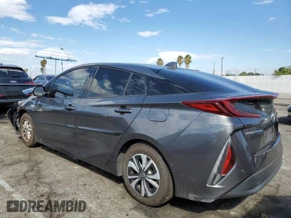 2018 Toyota Prius Plus z VIN JTDKARFP7J3086633, wystawiony jako Copart lot #82094685 z przebiegiem 275 692 mil mil oraz Szkoda całkowita • Salvage title. Historia ofert i sprzedaży dostępna na DreamBid. Obrazek 2.