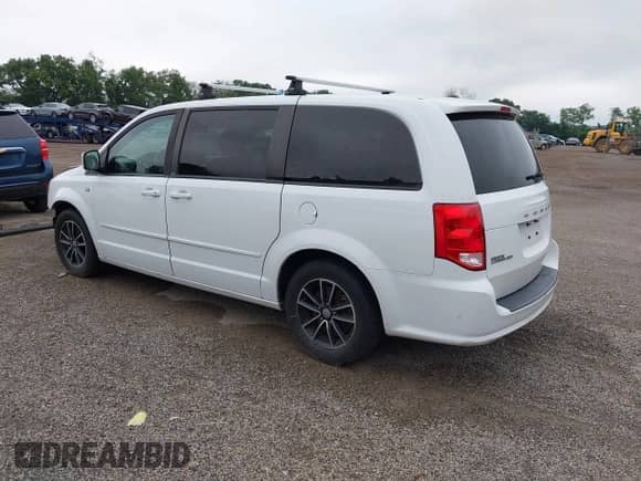 2014 Dodge Grand Caravan American Value with VIN 2C4RDGBG7ER340581, listed as a IAAI auction lot 42673357 with 106,997 mi miles and . Bid and sale history available at DreamBid. Image 3.