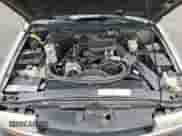 2000 Chevrolet S-10 LS z VIN 1GCCS19W0YK207461, wystawiony jako Copart lot #84808815 z przebiegiem 186 762 mil mil oraz Czysty tytuł • Clean title. Historia ofert i sprzedaży dostępna na DreamBid. Obrazek 11.