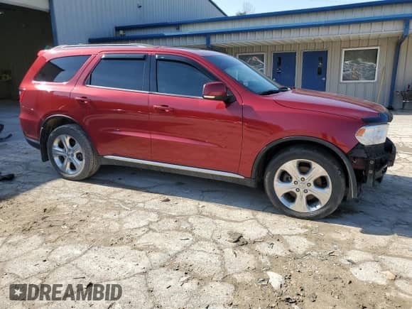 2015 Dodge Durango Crew with VIN 1C4SDJDT9FC823914, listed as a Copart auction lot 49847055 with 132,241 mi miles and Salvage title. Bid and sale history available at DreamBid. Image 4.