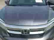 2021 Honda Pilot Touring 7-Passenger with VIN 5FNYF6H62MB041945, listed as a IAAI auction lot 43066698 with 102,187 mi miles and . Bid and sale history available at DreamBid. Image 6.