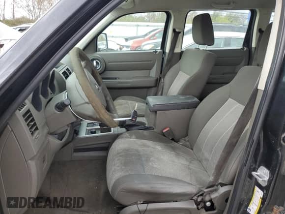 2009 Dodge Nitro SXT с VIN 1D8GU28K59W527001, выставлен на аукционе Copart как лот 77988964 с пробегом 157 787 миль миль и Списание • Salvage title. История ставок и продаж доступна на DreamBid. Изображение 7.