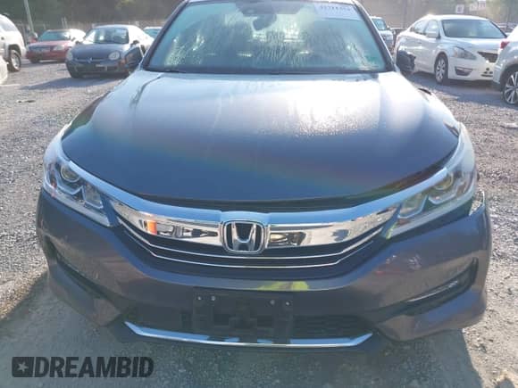 2016 Honda Accord EX-L with VIN 1HGCR2F98GA009040, listed as a IAAI auction lot 42711353 with 166,258 mi miles and . Bid and sale history available at DreamBid. Image 12.