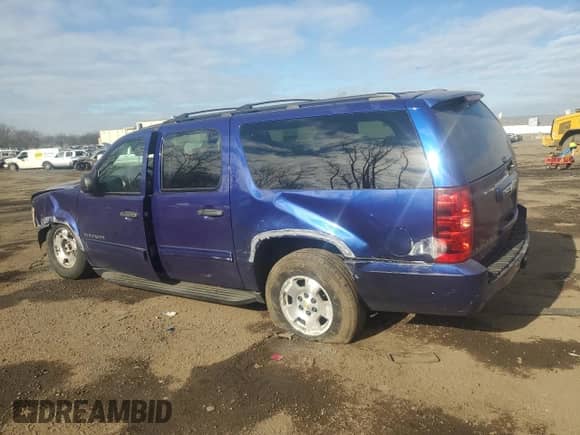 2010 Chevrolet Suburban Commercial z VIN 1GNUKHE30AR224497, wystawiony jako Copart lot #88404515 z przebiegiem 173 205 mil mil oraz Szkoda całkowita • Salvage title. Historia ofert i sprzedaży dostępna na DreamBid. Obrazek 2.