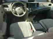 2014 Toyota Sienna LE with VIN 5TDKK3DC3ES479687, listed as a Copart auction lot 82269765 with 147,663 mi miles and Salvage title. Bid and sale history available at DreamBid. Image 8.