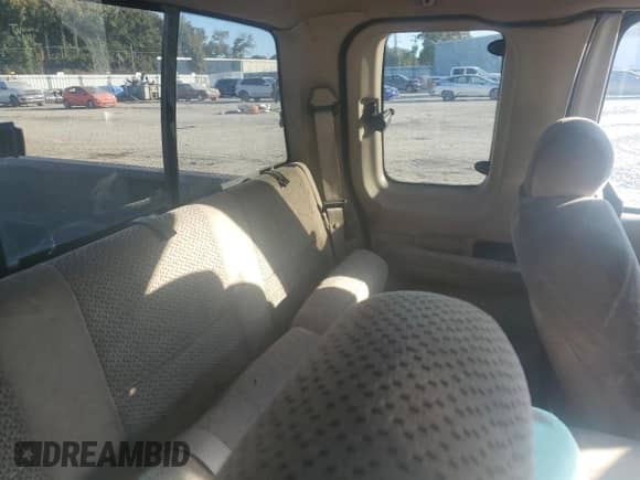 2001 Ford F-150 с VIN 2FTZX17221CA27274, выставлен на аукционе Copart как лот 77949204 с пробегом Не указан миль и Списание • Salvage title. История ставок и продаж доступна на DreamBid. Изображение 10.