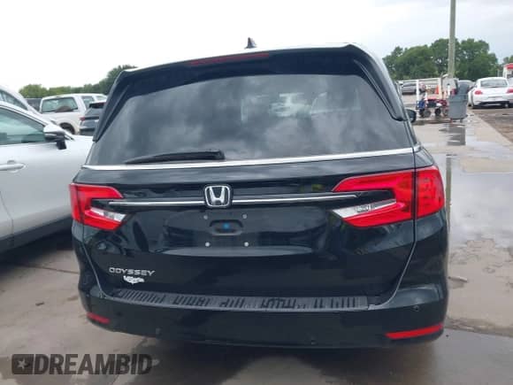 2021 Honda Odyssey EX-L with VIN 5FNRL6H77MB038996, listed as a IAAI auction lot 42647748 with 22,535 mi miles and . Bid and sale history available at DreamBid. Image 16.