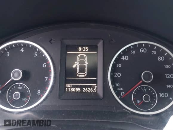 2011 Volkswagen Tiguan SE z VIN WVGAV7AX9BW534166, wystawiony jako IAAI lot #41146905 z przebiegiem 118 095 mil mil oraz . Historia ofert i sprzedaży dostępna na DreamBid. Obrazek 7.