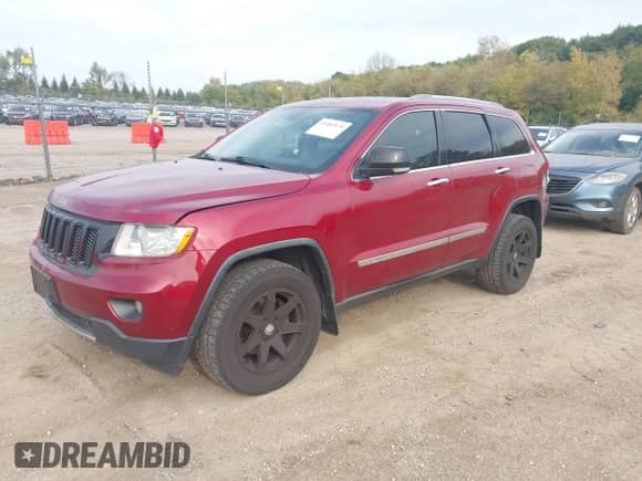 2012 Jeep Grand Cherokee Limited z VIN 1C4RJFBG1CC217321, wystawiony jako IAAI lot #43483579 z przebiegiem 178 840 mil mil oraz . Historia ofert i sprzedaży dostępna na DreamBid. Obrazek 17.