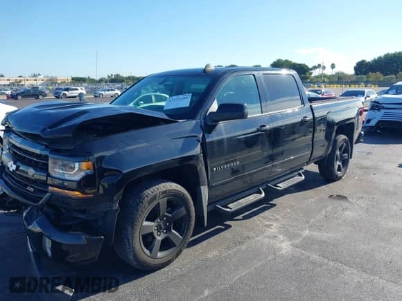2017 Chevrolet Silverado 1500 LT with VIN 1GCUKREC3HF235469, listed as a IAAI auction lot 43219480 with 86,908 mi miles and . Bid and sale history available at DreamBid. Image 17.