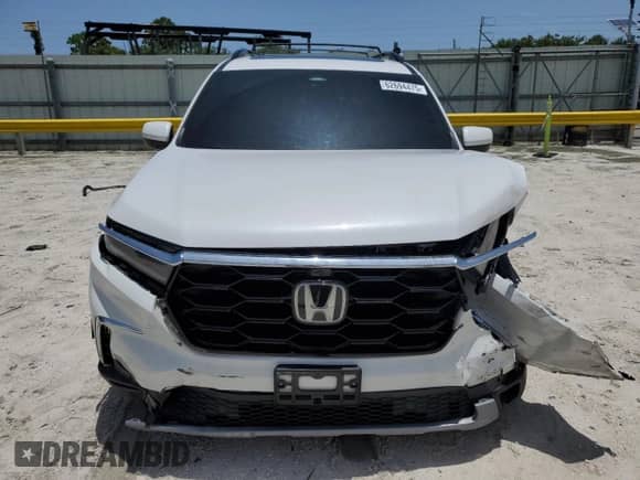 2023 Honda Pilot Elite с VIN 5FNYG1H80PB009677, выставлен на аукционе Copart как лот 62694475 с пробегом 33 436 миль миль и Списание • Salvage title. История ставок и продаж доступна на DreamBid. Изображение 5.