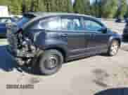 2009 Dodge Caliber SXT with VIN 1B3HB48A39D130816, listed as a Copart auction lot 82270345 with 106,380 mi miles and Salvage title. Bid and sale history available at DreamBid. Image 3.