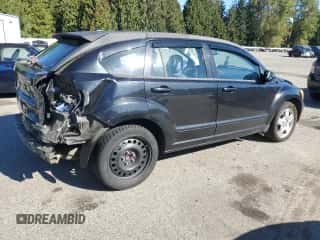 2009 Dodge Caliber SXT z VIN 1B3HB48A39D130816, wystawiony jako Copart lot #82270345 z przebiegiem 106 380 mil mil oraz Szkoda całkowita • Salvage title. Historia ofert i sprzedaży dostępna na DreamBid. Obrazek 3.