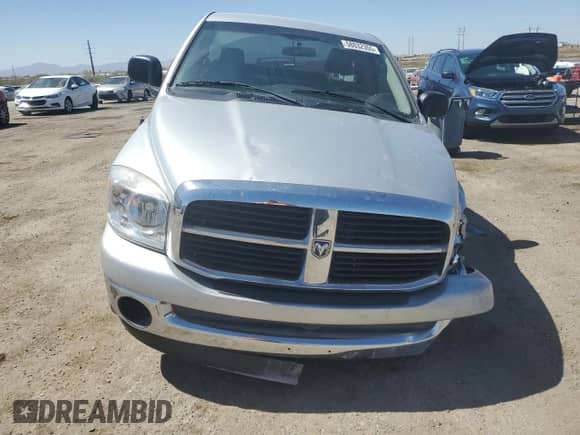 2007 Dodge 1500 SLT z VIN 1D7HA16247J517990, wystawiony jako Copart lot #58032355 z przebiegiem 96 247 mil mil oraz Szkoda całkowita • Salvage title. Historia ofert i sprzedaży dostępna na DreamBid. Obrazek 5.