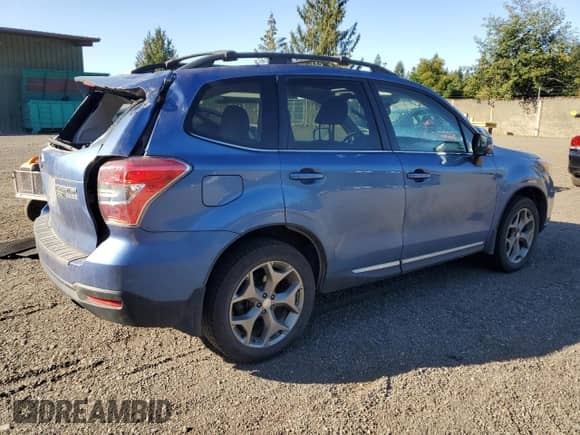2016 Subaru Forester Touring with VIN JF2SJAXC5GH497104, listed as a Copart auction lot 80828875 with 119,555 mi miles and Salvage title. Bid and sale history available at DreamBid. Image 3.