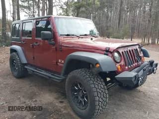 2007 Jeep Wrangler Unlimited X с VIN 1J4GA39177L195364, выставлен на аукционе IAAI как лот 41208844 с пробегом 147 059 миль миль и . История ставок и продаж доступна на DreamBid. Изображение 1.