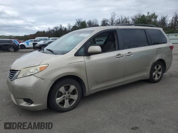 2015 Toyota Sienna LE AAS with VIN 5TDKK3DC6FS641006, listed as a Copart auction lot 69465255 with 200,844 mi miles and Clean title. Bid and sale history available at DreamBid. Image 1.