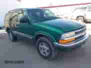 1999 Chevrolet Blazer LT z VIN 1GNDT13W5X2131249, wystawiony jako IAAI lot #42306564 z przebiegiem 162 149 mil mil oraz . Historia ofert i sprzedaży dostępna na DreamBid. Obrazek 1.
