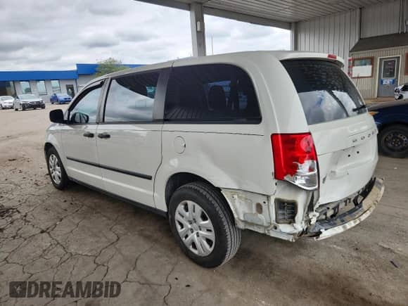 2013 Dodge Grand Caravan American Value with VIN 2C4RDGBG6DR765319, listed as a Copart auction lot 69782895 with 129,861 mi miles and Salvage title. Bid and sale history available at DreamBid. Image 2.