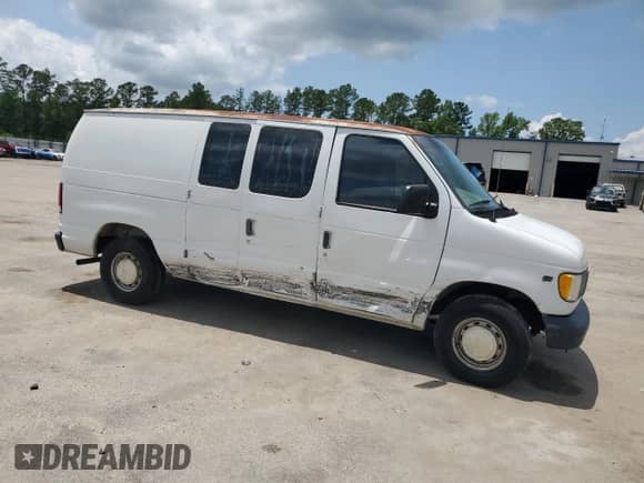 2000 Ford Econoline Cargo with VIN 1FTRE14W3YHA95843, listed as a Copart auction lot 59744325 with 234,748 mi miles and Salvage title. Bid and sale history available at DreamBid. Image 4.