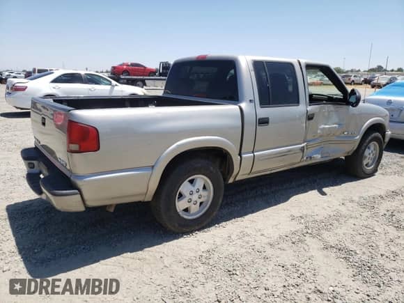 2004 Chevrolet S-10 LS z VIN 1GCDT13X14K113828, wystawiony jako Copart lot #64229655 z przebiegiem 100 013 mil mil oraz Szkoda całkowita • Salvage title. Historia ofert i sprzedaży dostępna na DreamBid. Obrazek 3.