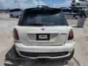 2009 MINI Hardtop S with VIN WMWMF73569TW87834, listed as a Copart auction lot 60362395 with 52,448 mi miles and Salvage title. Bid and sale history available at DreamBid. Image 6.