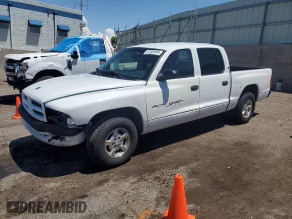 2001 Dodge Dakota Sport with VIN 1B7GL2AX61S222402, listed as a Copart auction lot 67203985 with 177,726 mi miles and Salvage title. Bid and sale history available at DreamBid. Image 1.