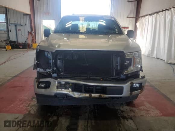 2018 Ford F-150 XL с VIN 1FTEX1EP9JFA77722, выставлен на аукционе Copart как лот 84804125 с пробегом 129 745 миль миль и Списание • Salvage title. История ставок и продаж доступна на DreamBid. Изображение 5.