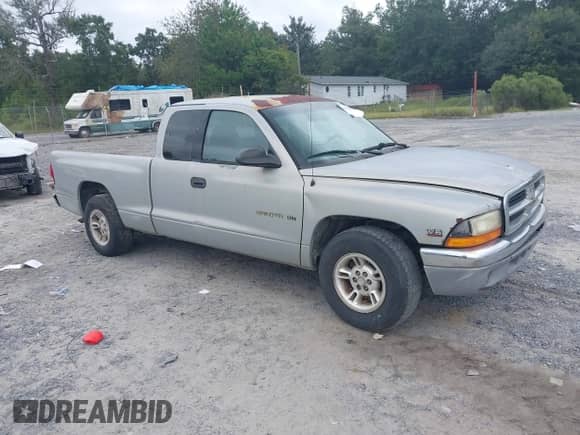 1998 Dodge Dakota SLT с VIN 1B7GL22X2WS677463, выставлен на аукционе IAAI как лот 43185225 с пробегом 218 259 миль миль и . История ставок и продаж доступна на DreamBid. Изображение 1.