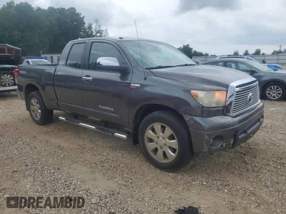 2012 Toyota Tundra Limited z VIN 5TFSY5F10CX132864, wystawiony jako Copart lot #70156505 z przebiegiem 186 395 mil mil oraz Szkoda całkowita • Salvage title. Historia ofert i sprzedaży dostępna na DreamBid. Obrazek 4.