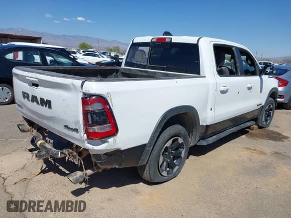 2022 Ram 1500 Rebel z VIN 1C6SRFLT4NN357352, wystawiony jako IAAI lot #41881613 z przebiegiem 31 285 mil mil oraz . Historia ofert i sprzedaży dostępna na DreamBid. Obrazek 4.