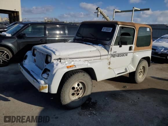 1993 Jeep Wrangler with VIN 1J4FY69S9PP226771, listed as a Copart auction lot 82136524 with Not provided miles and Salvage title. Bid and sale history available at DreamBid. Image 1.