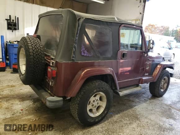 2001 Jeep Wrangler Sahara z VIN 1J4FA59S11P334534, wystawiony jako Copart lot #90651005 z przebiegiem 155 822 mil mil oraz Czysty tytuł • Clean title. Historia ofert i sprzedaży dostępna na DreamBid. Obrazek 3.