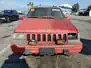 1994 Jeep Grand Cherokee Limited z VIN 1J4GZ78Y2RC101344, wystawiony jako Copart lot #83863965 z przebiegiem 129 830 mil mil oraz Czysty tytuł • Clean title. Historia ofert i sprzedaży dostępna na DreamBid. Obrazek 5.