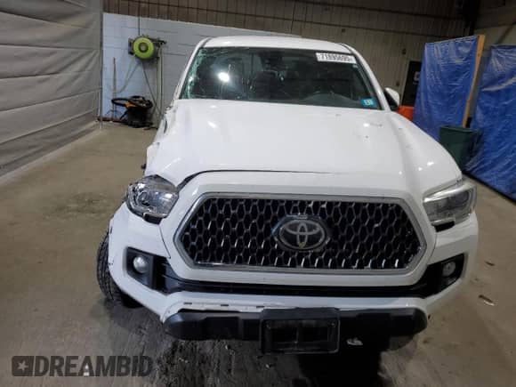 2019 Toyota Tacoma TRD Off Road with VIN 3TMCZ5AN8KM217225, listed as a Copart auction lot 71895695 with 80,104 mi miles and Salvage title. Bid and sale history available at DreamBid. Image 5.